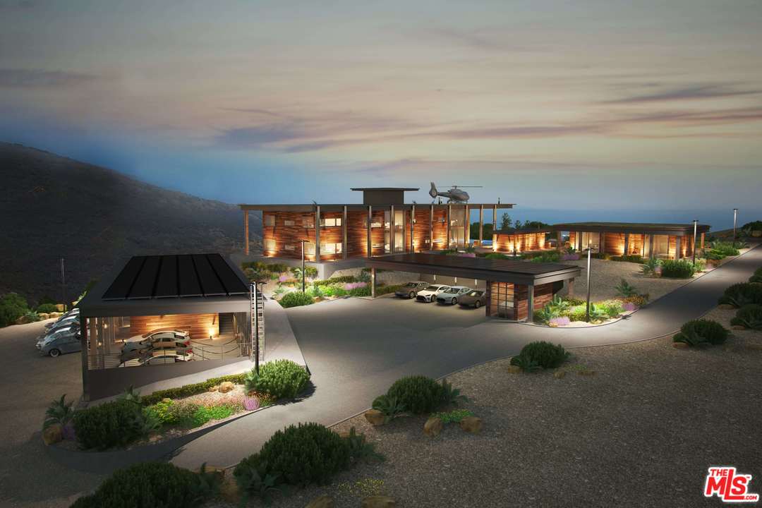 9950 Cotharin Road Malibu, CA 90265 - Photo 4 of 48 a gym area with table and chairs