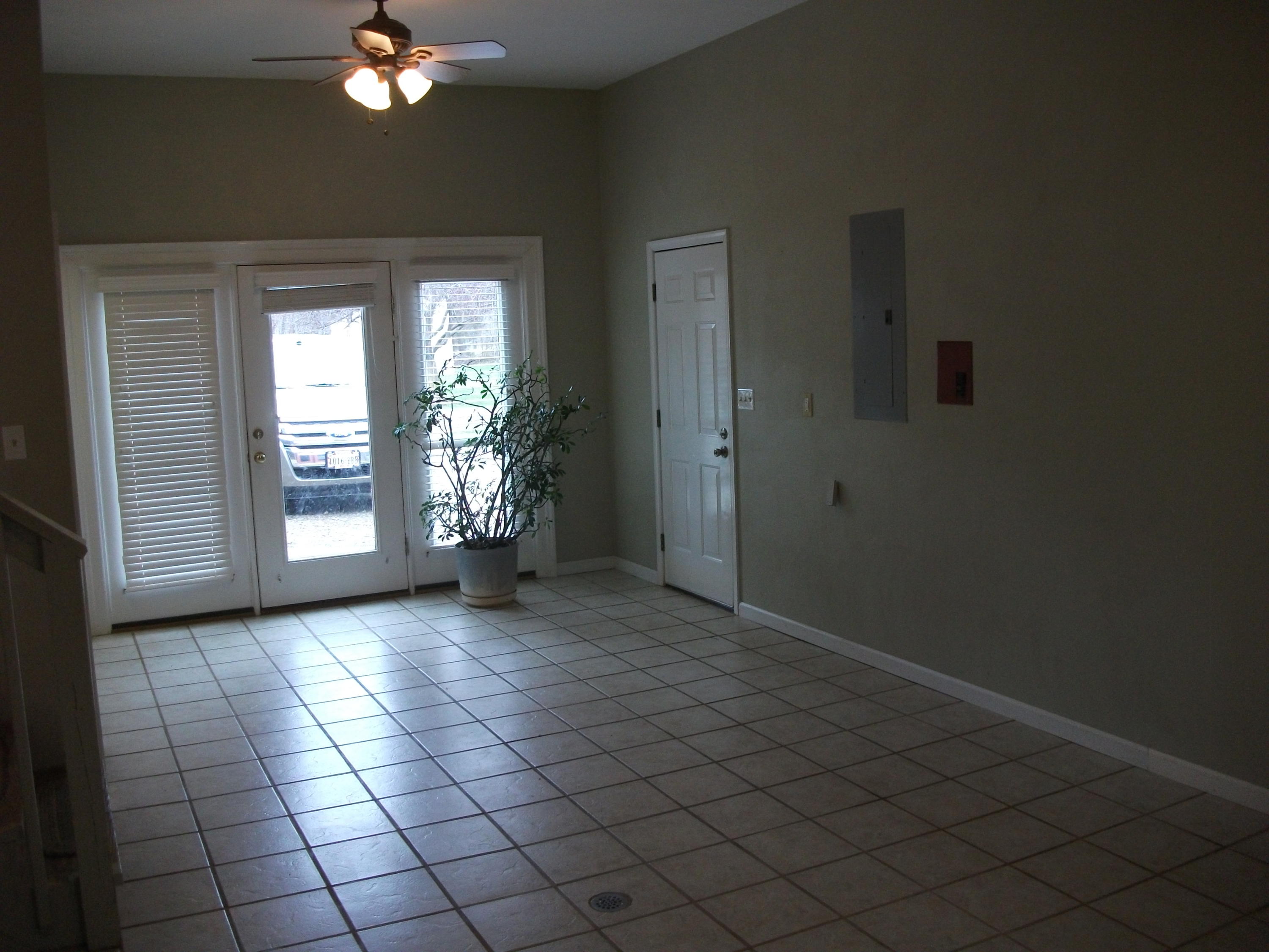 726 Swenfield Road Callaway, VA 24067 - Photo 20 of 40 an empty room with chandelier fan and windows