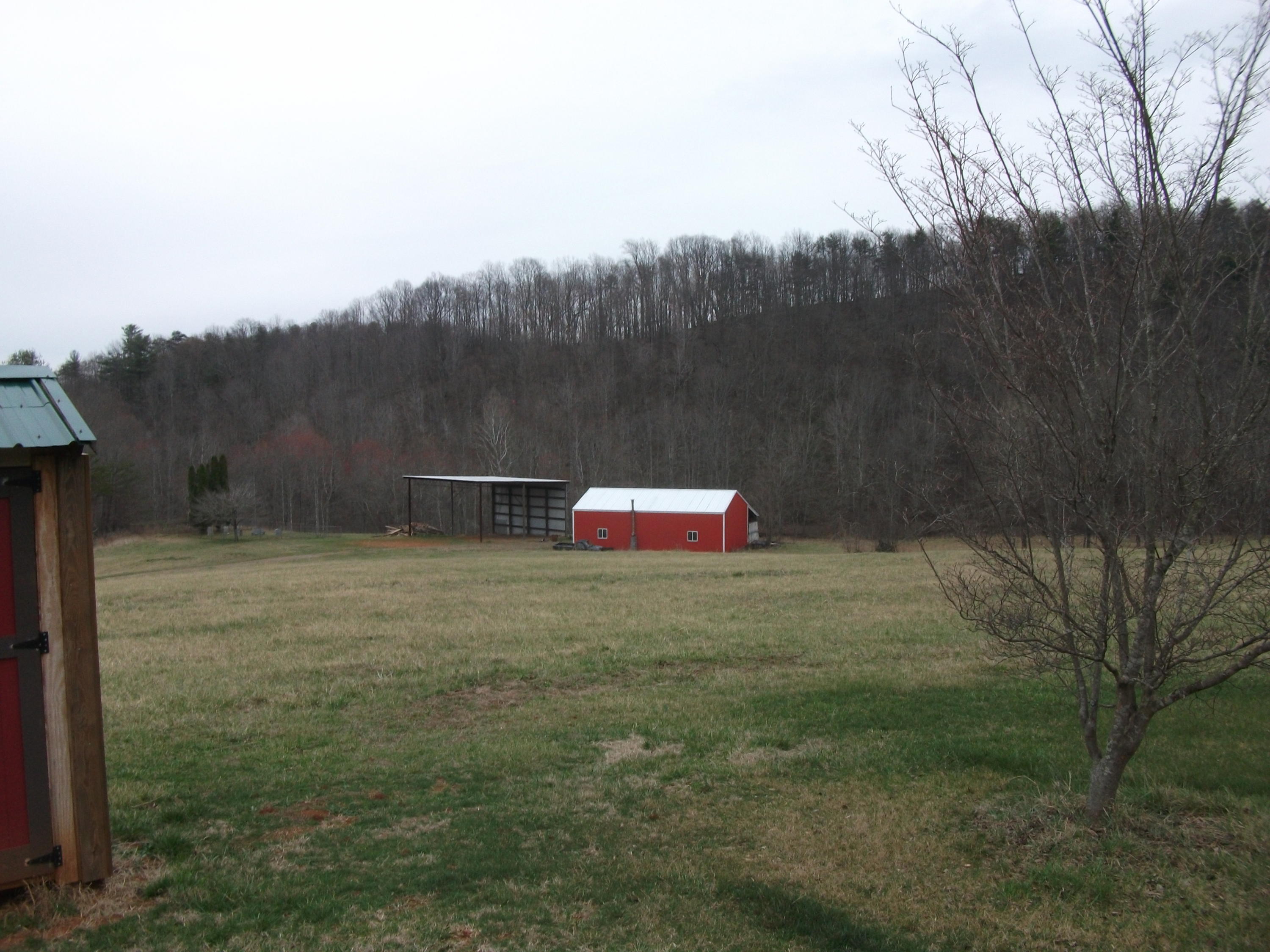 726 Swenfield Road Callaway, VA 24067 - Photo 26 of 40 a backyard of a house with table and chairs