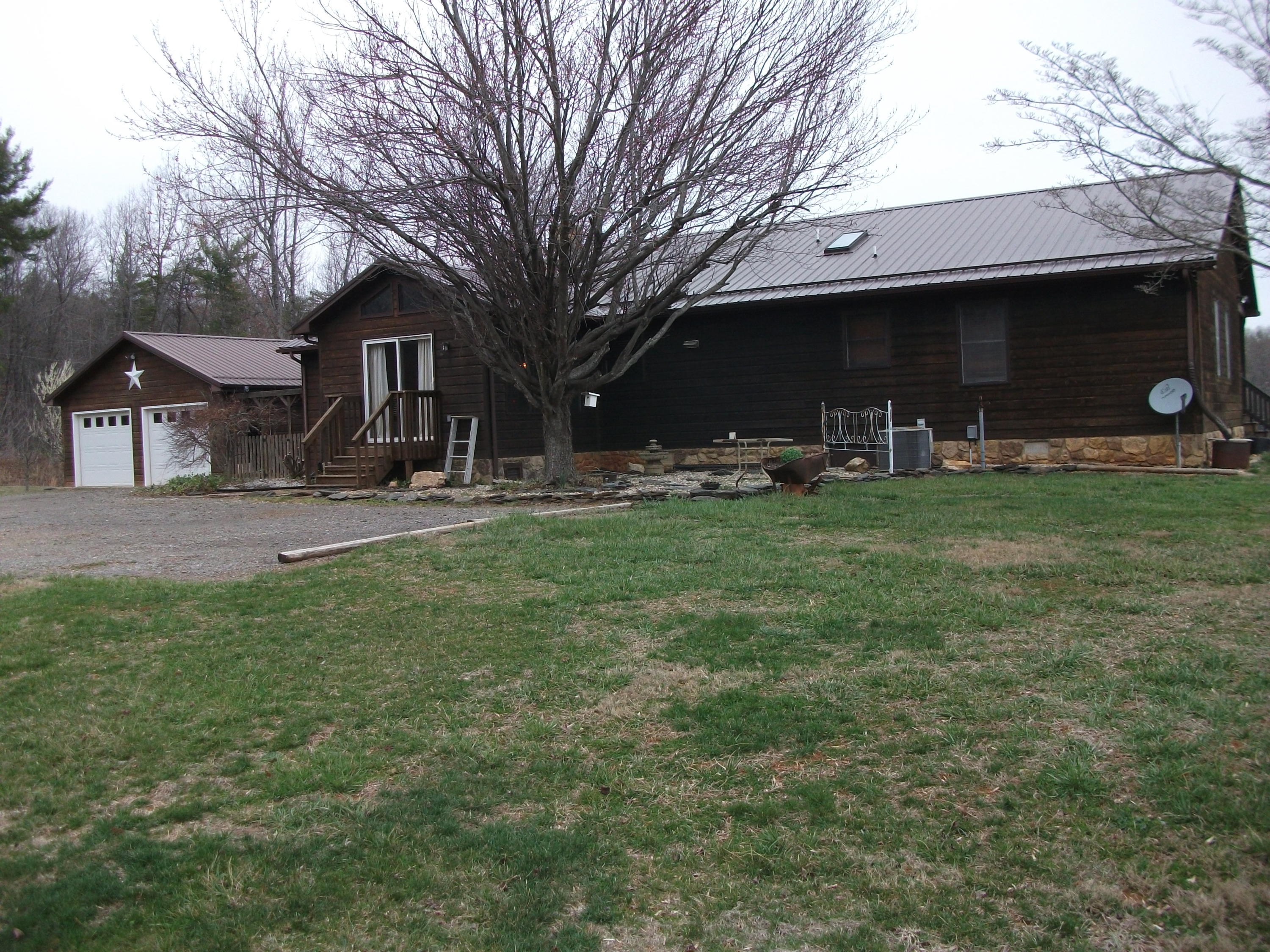 726 Swenfield Road Callaway, VA 24067 - Photo 39 of 40 a front view of a house with a yard and trees