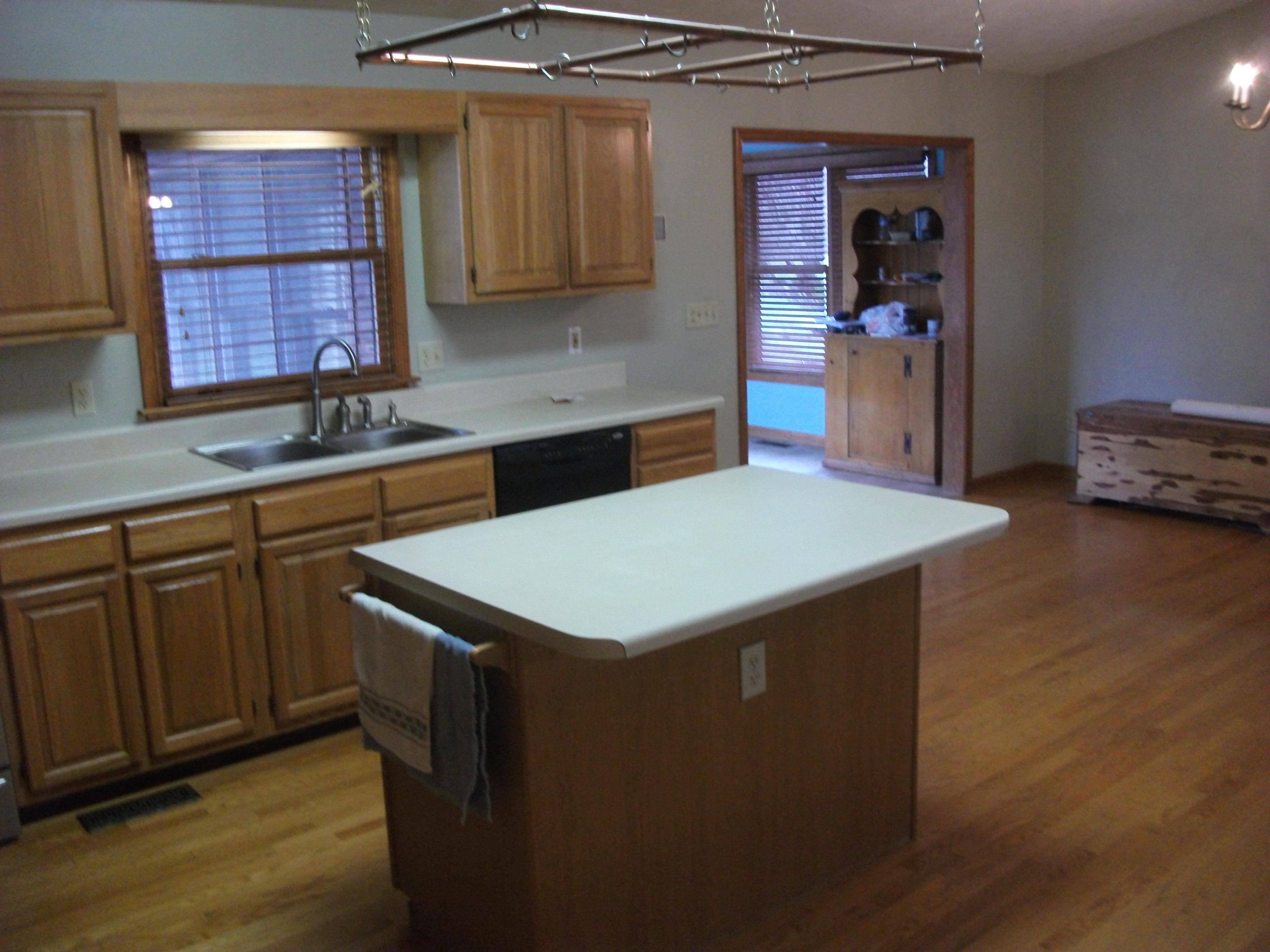 726 Swenfield Road Callaway, VA 24067 - Photo 9 of 40 a kitchen with a sink a window and cabinets