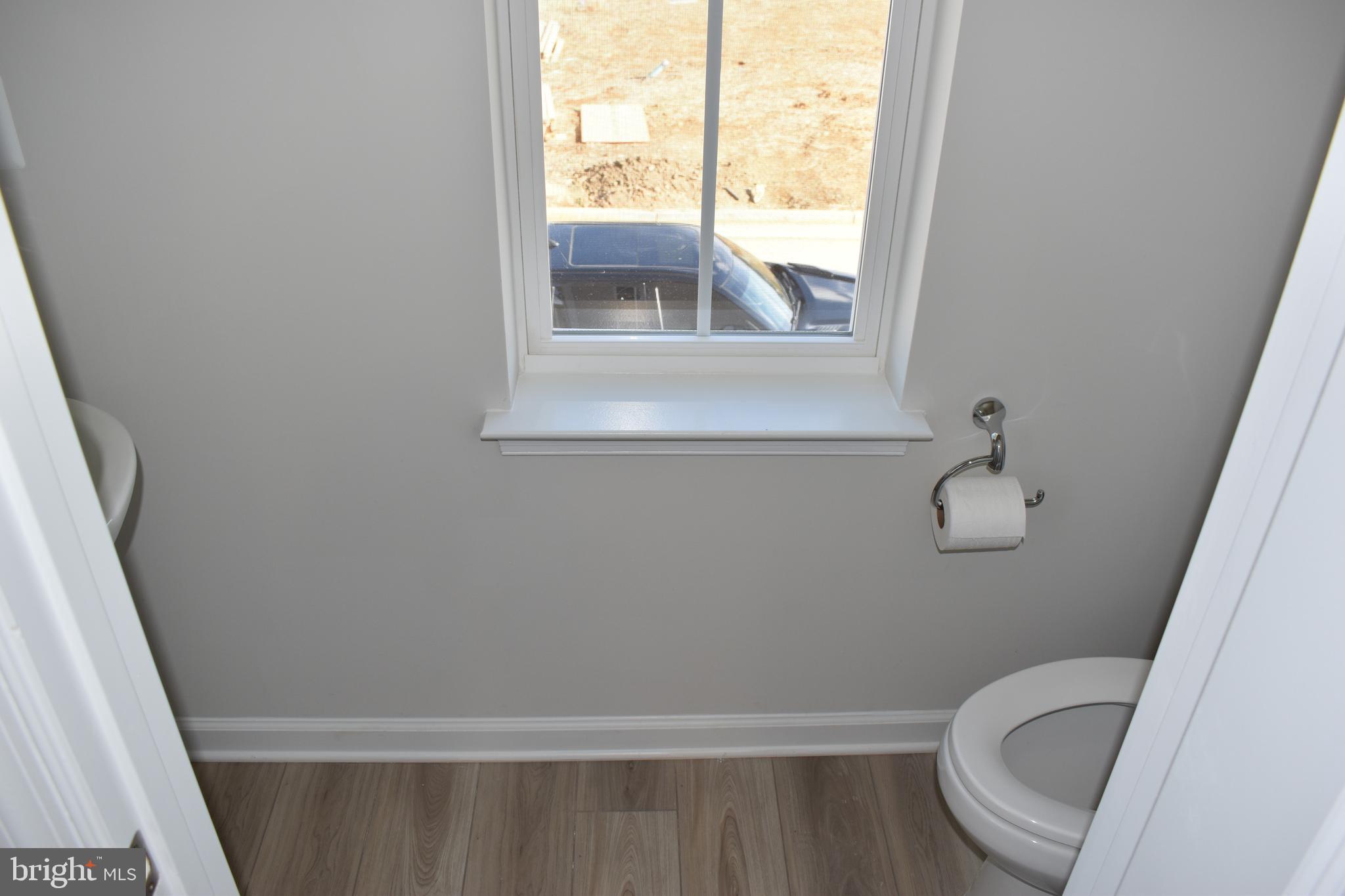 224 Swan Fld Avenue Ranson, WV 25438 - Photo 18 of 34 a bathroom with a toilet and a window