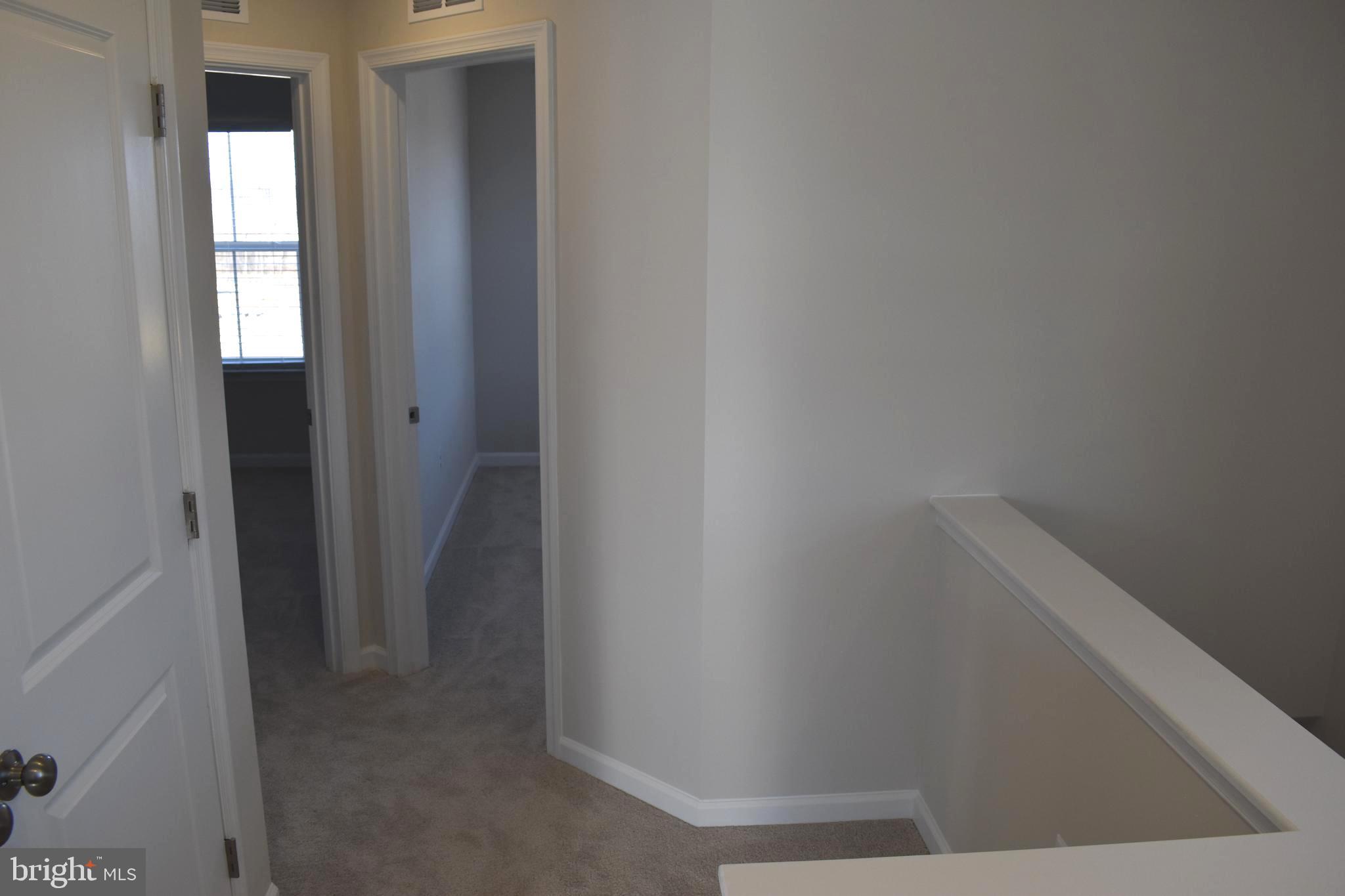 224 Swan Fld Avenue Ranson, WV 25438 - Photo 22 of 34 a view of hallway with window