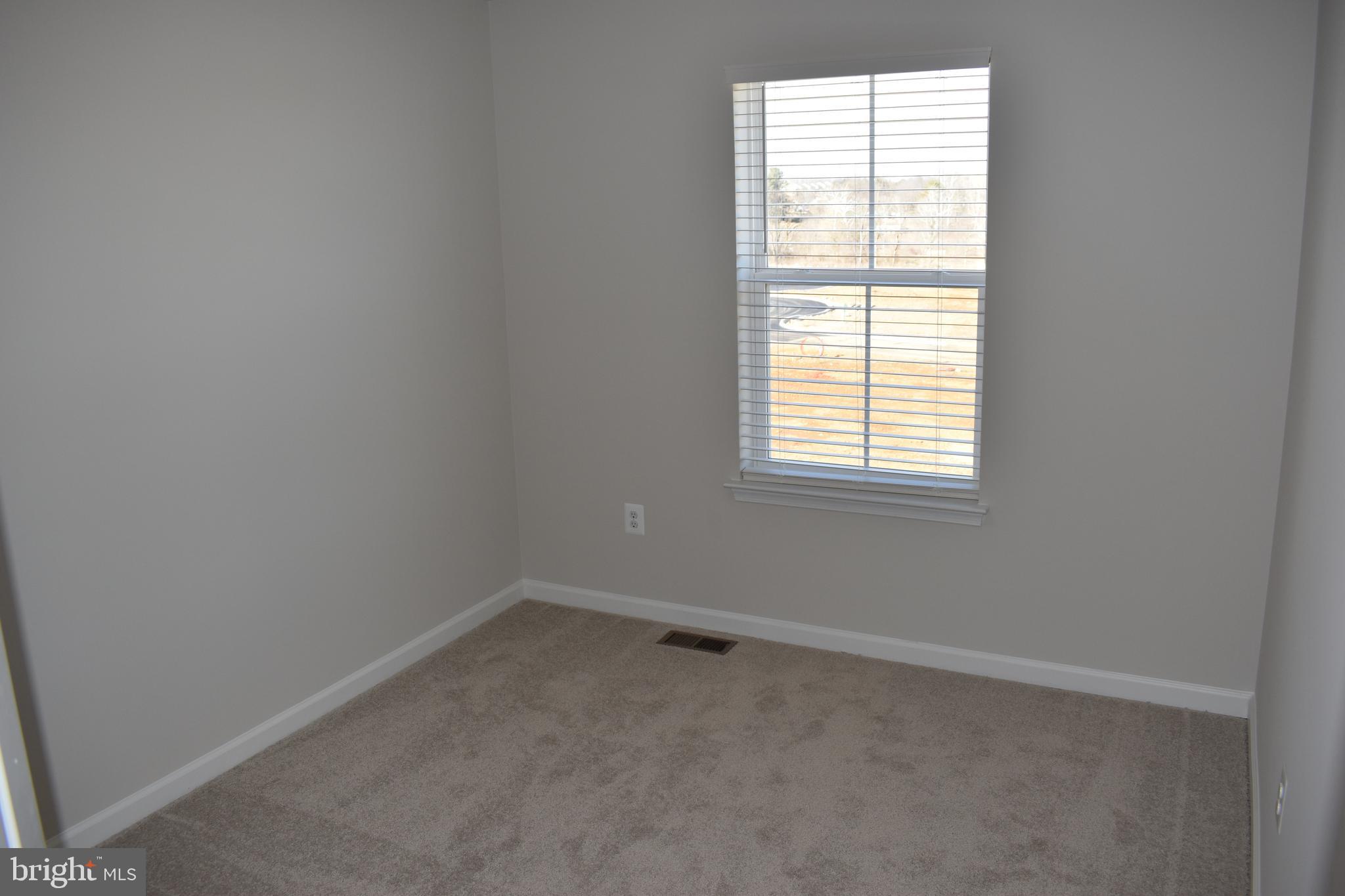 224 Swan Fld Avenue Ranson, WV 25438 - Photo 24 of 34 an empty room with a window