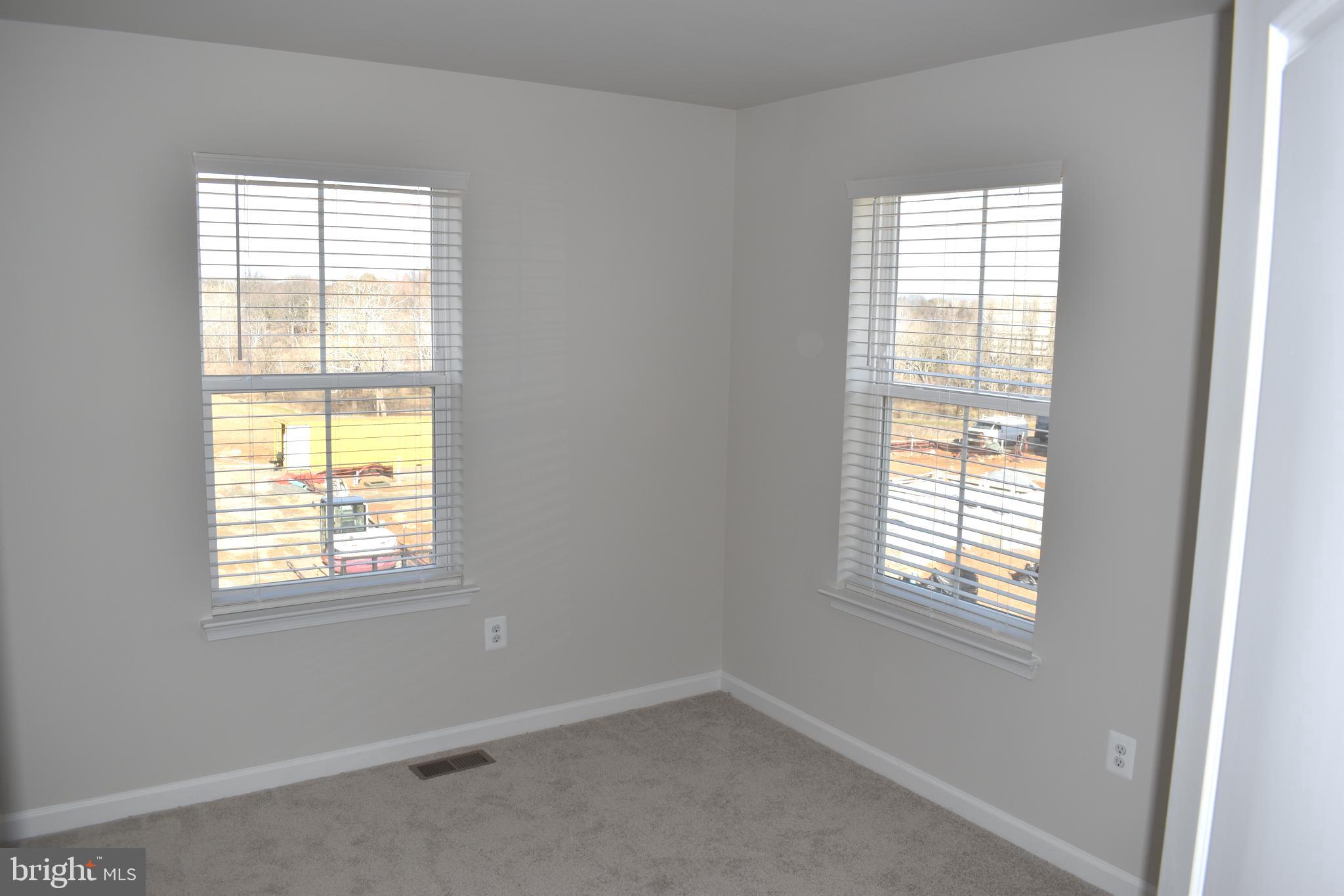 224 Swan Fld Avenue Ranson, WV 25438 - Photo 26 of 34 an empty room with a window