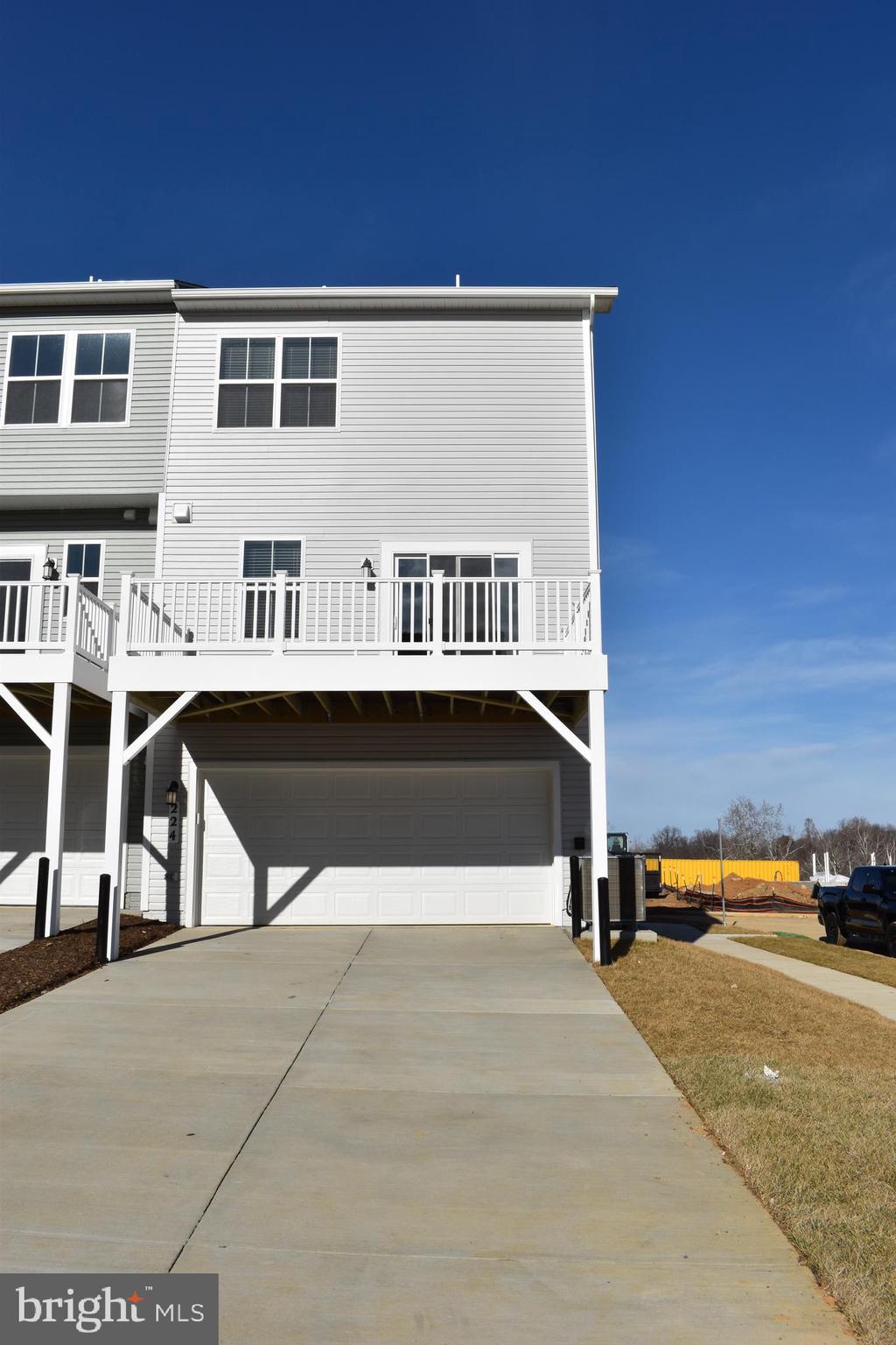 224 Swan Fld Avenue Ranson, WV 25438 - Photo 4 of 34 a view of building with car parked