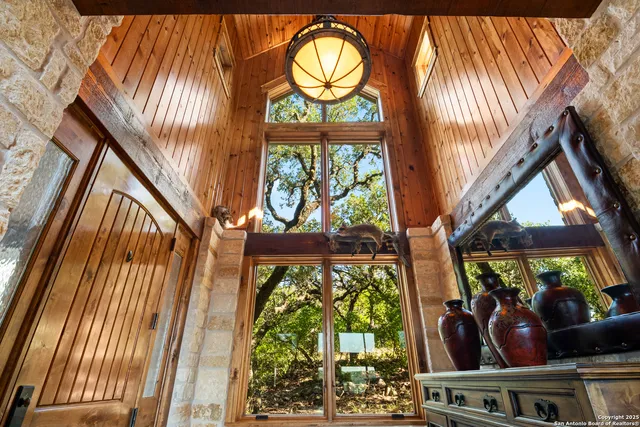 a view of a patio with table and chairs