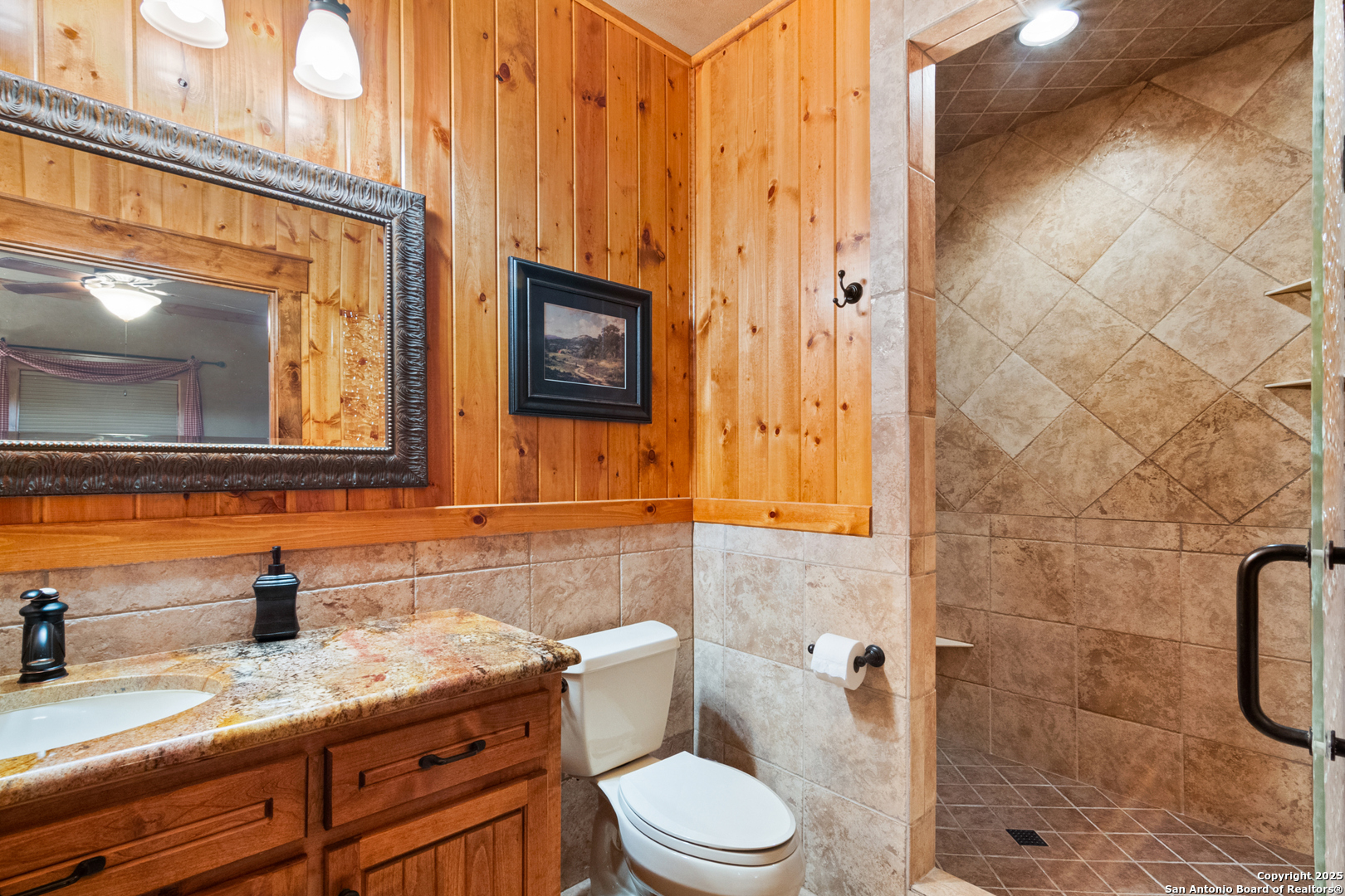432 Cat Claw Concan, TX 78838 - Photo 34 of 76 a bathroom with a granite countertop sink toilet and shower