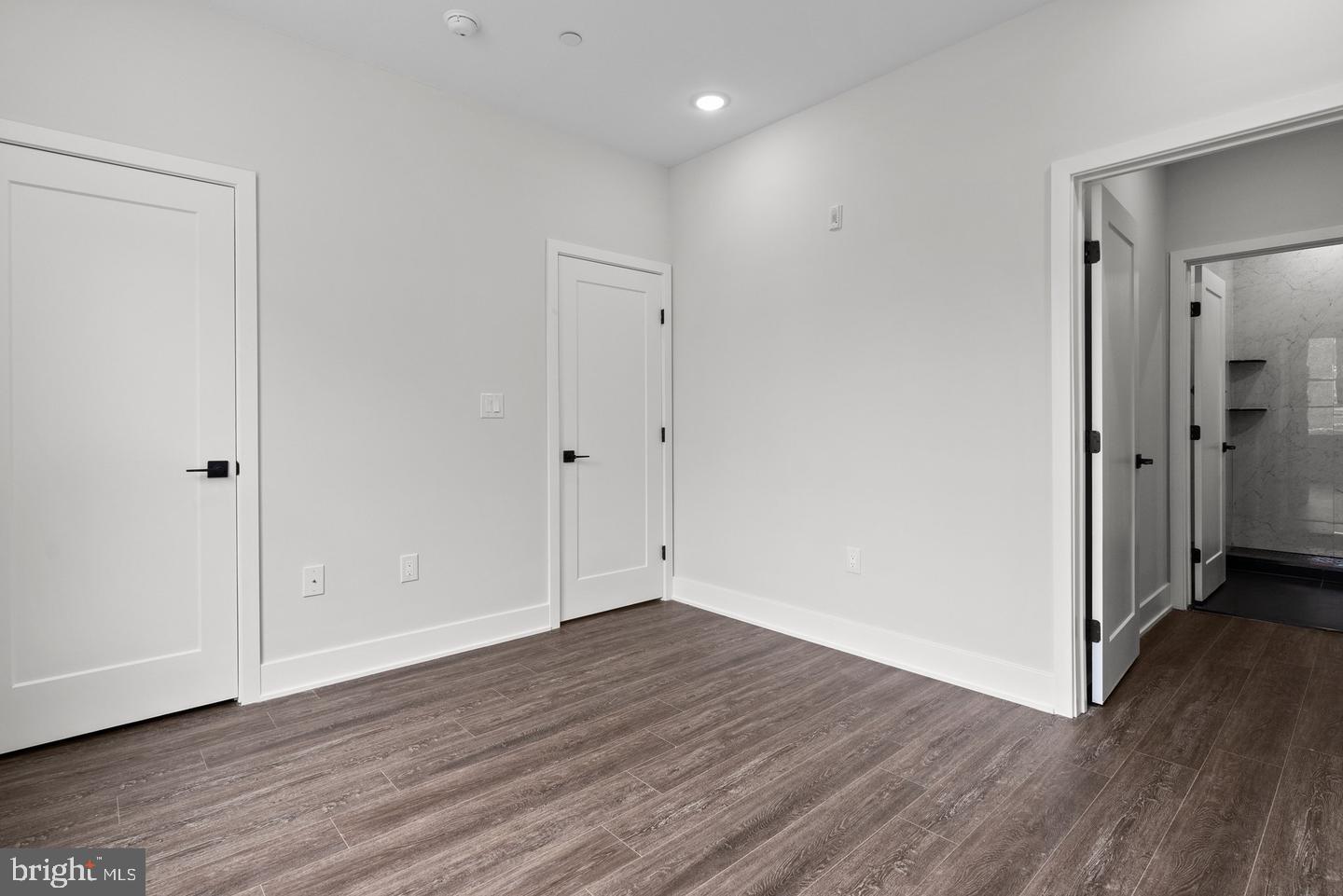 2146 North Front Street Philadelphia, PA 19122 - Photo 15 of 39 a view of an empty room with wooden floor