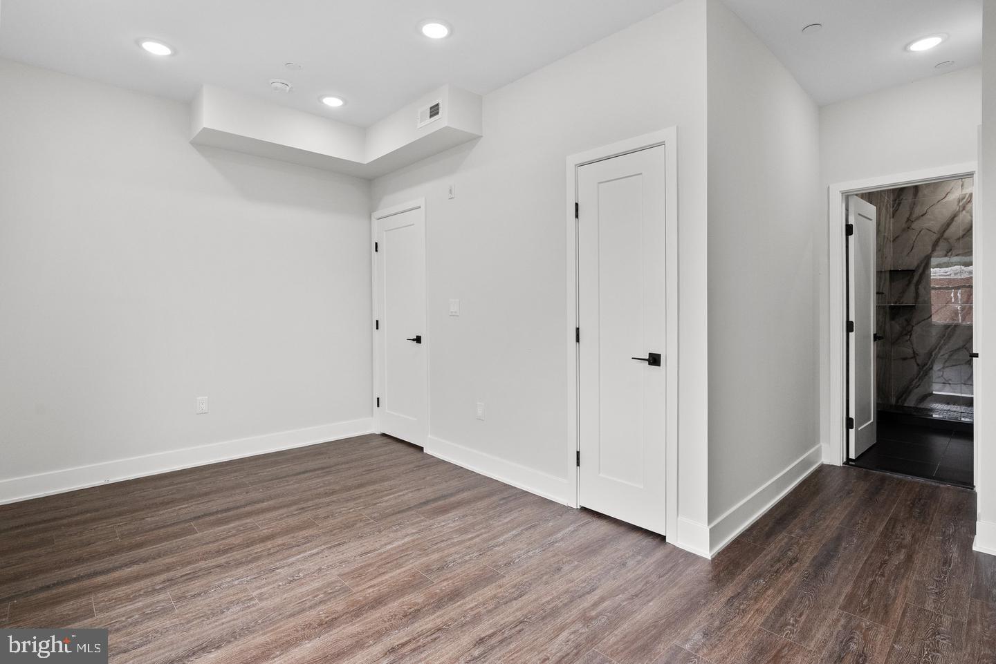 2146 North Front Street Philadelphia, PA 19122 - Photo 23 of 39 a view of an empty room with wooden floor