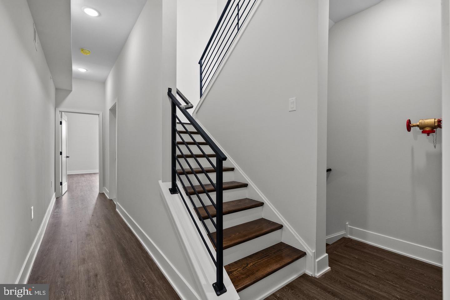 2146 North Front Street Philadelphia, PA 19122 - Photo 29 of 39 a view of a hallway with wooden floor and entryway