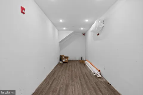 a view of wooden floor in an empty room