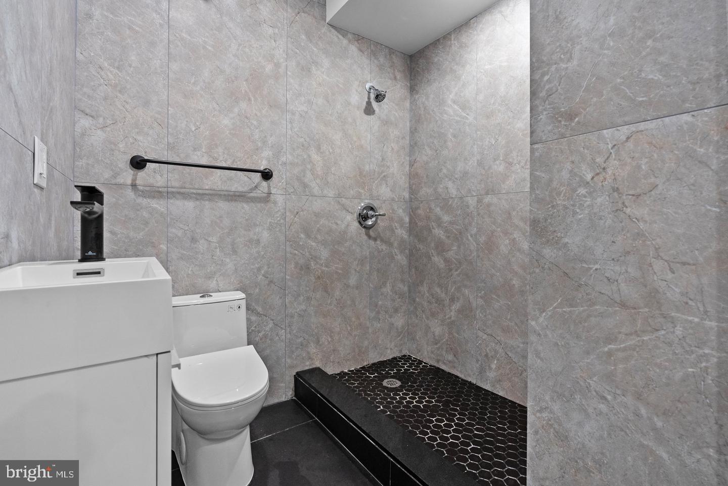 2146 North Front Street Philadelphia, PA 19122 - Photo 10 of 39 a bathroom with a sink and a toilet