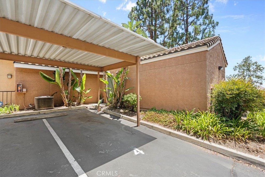 10655 Lemon Avenue, Unit 104 Rancho Cucamonga, CA 91737 - Photo 17 of 21 Dedicated parking at back door.