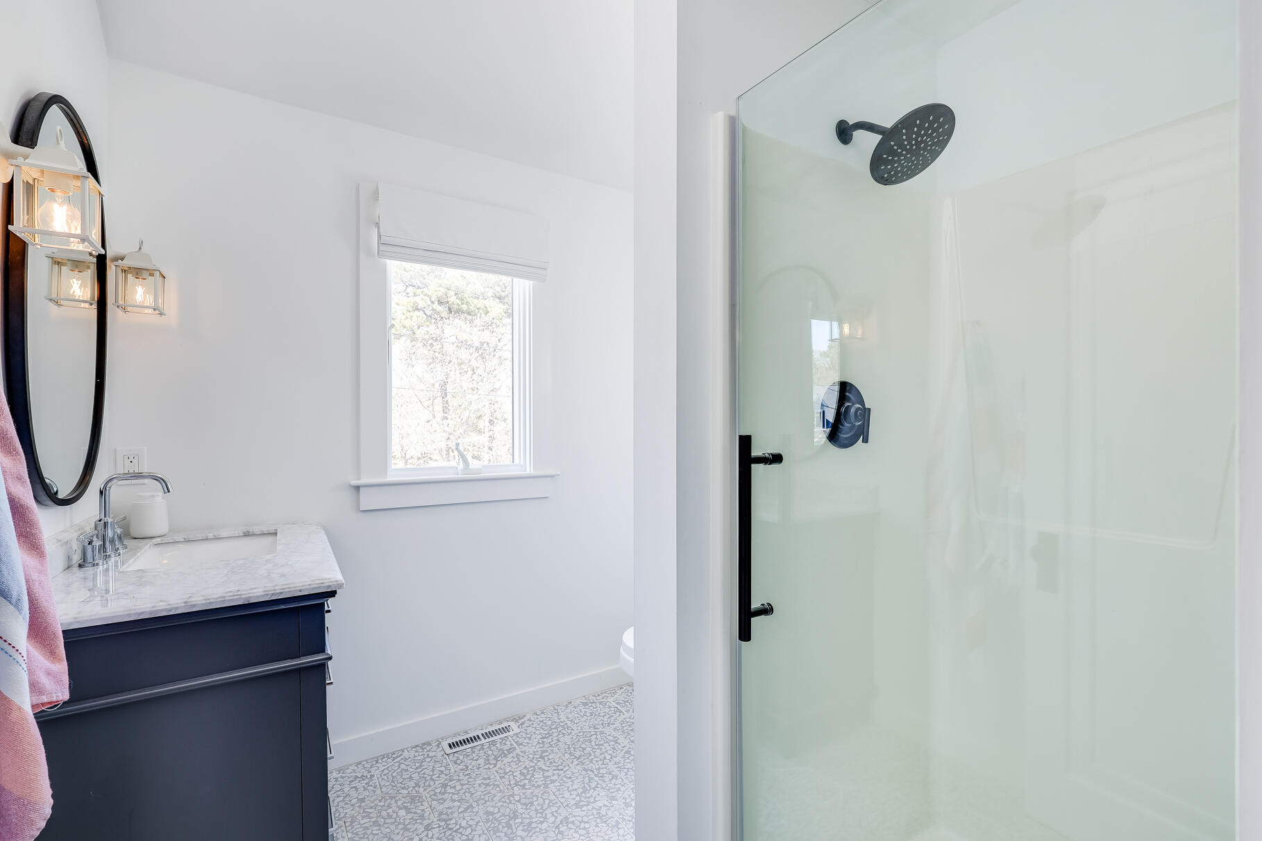 249 Ridgevale Road Chatham, MA 02633 - Photo 54 of 72 a bathroom with a shower sink and mirror