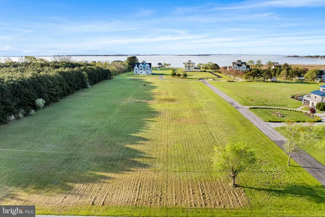 a view of an ocean and a mountain