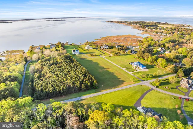 a view of a swimming pool with an ocean view