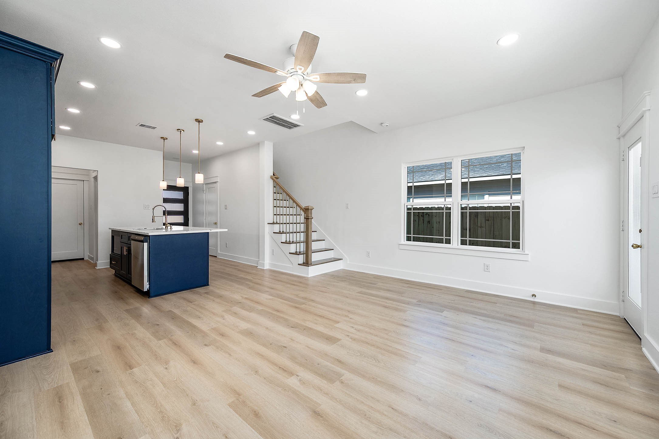 8602 Hoffman Street Houston, TX 77016 - Photo 16 of 30 Different perspective highlighting the open-concept layout and smooth flow between the living area and kitchen.