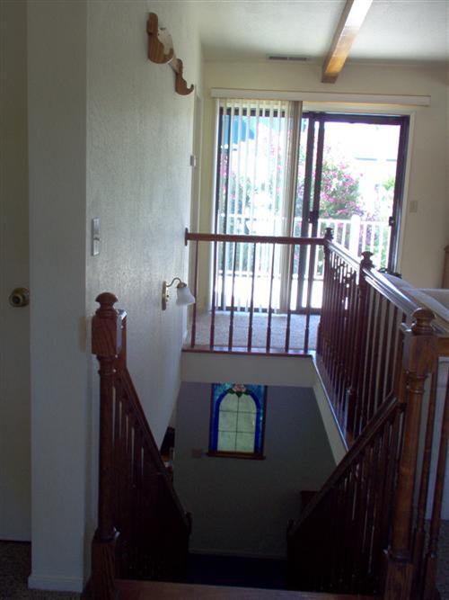 703 Poker Flat Road Copperopolis, CA 95228 - Photo 14 of 24 a view of entryway and hall with a window