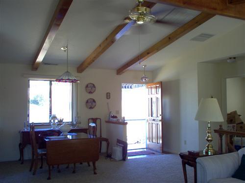 703 Poker Flat Road Copperopolis, CA 95228 - Photo 4 of 24 a living room with furniture and a window