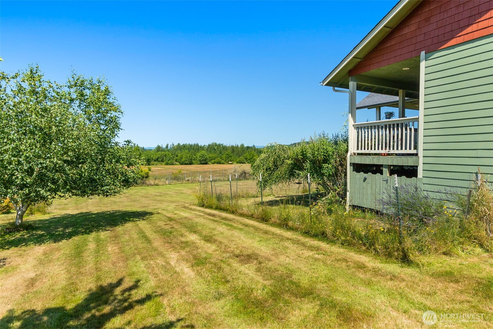 225 Maw Road Toledo, WA 98591 - Photo 28 of 34 a view of a house with a yard