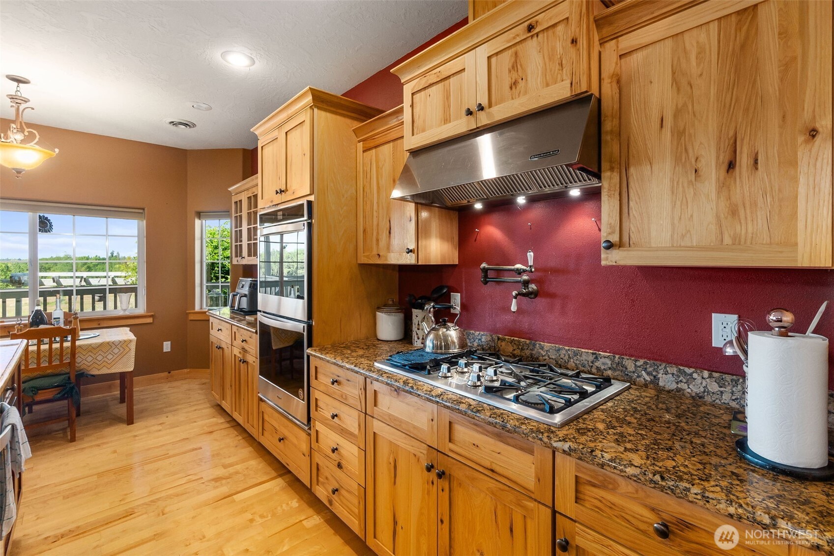 225 Maw Road Toledo, WA 98591 - Photo 7 of 34 a kitchen with stove and cabinets