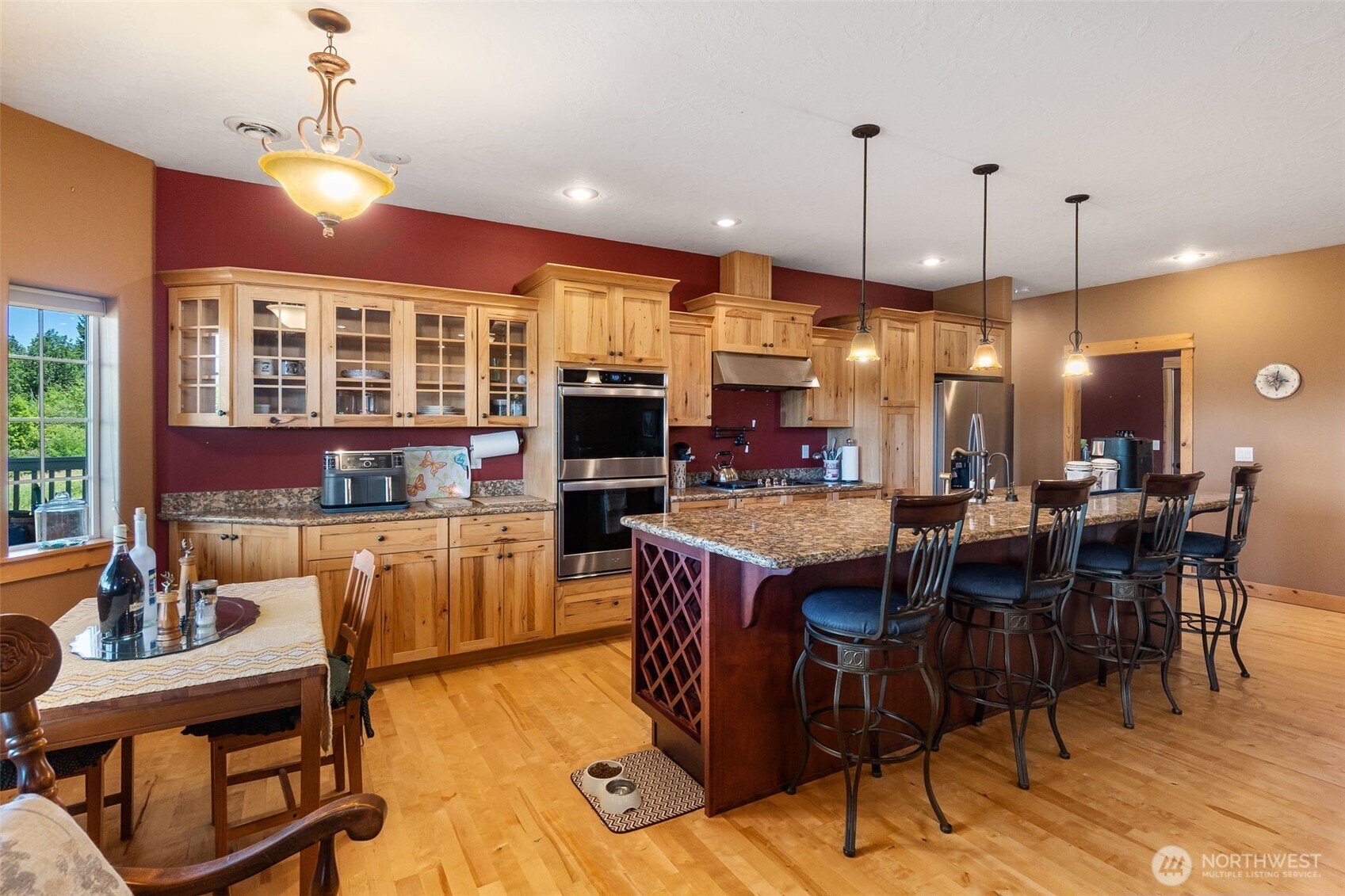 225 Maw Road Toledo, WA 98591 - Photo 8 of 34 a large kitchen with a table and chairs