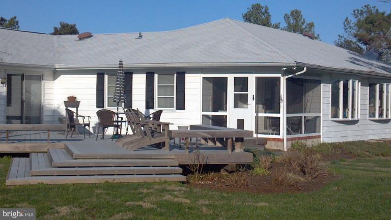 5723 Morris Neck Road Cambridge, MD 21613 - Photo 25 of 30 Back screened porch and deck