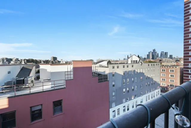 a view of a city with tall buildings