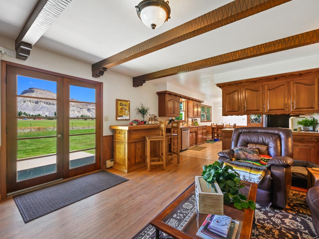 3418 F Road Clifton, CO 81520 - Photo 7 of 41 a living room with furniture kitchen view and a large window