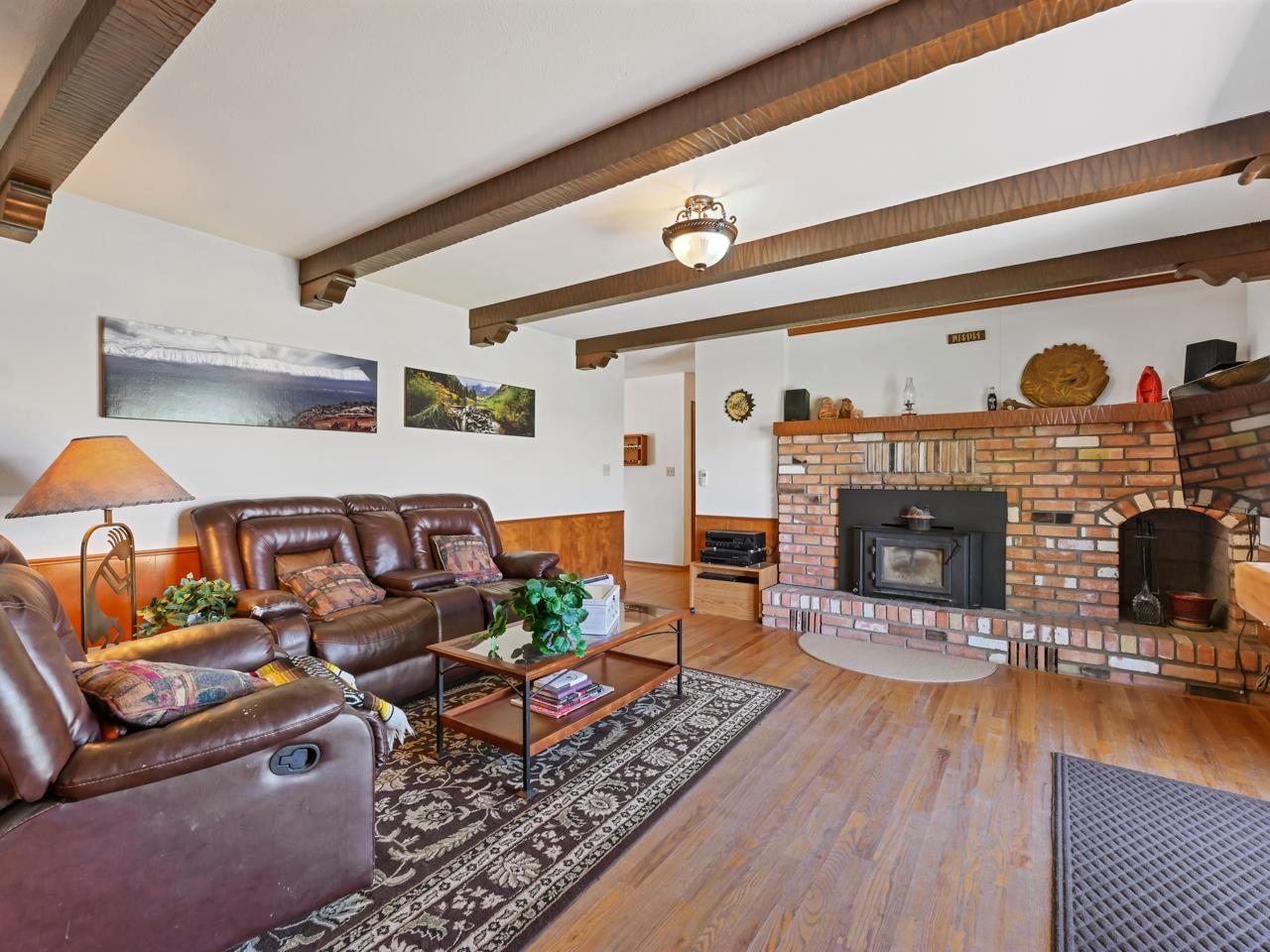 3418 F Road Clifton, CO 81520 - Photo 8 of 41 a living room with furniture and a fireplace