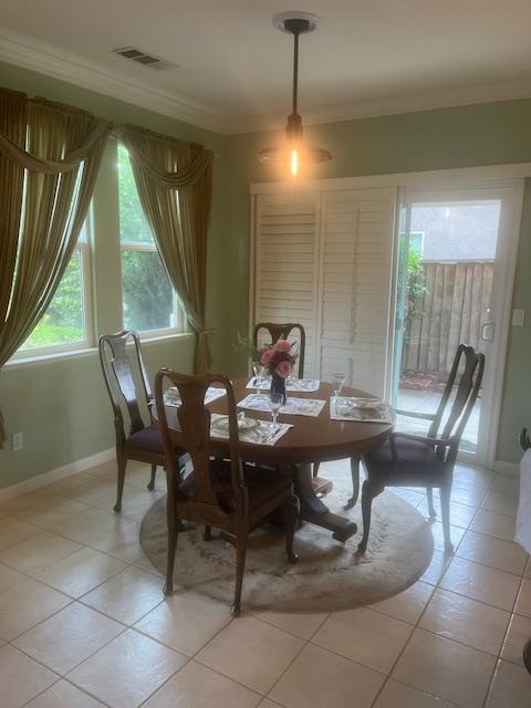 812 Vía Rosa Los Banos, CA 93635 - Photo 12 of 18 a view of a dining room with furniture window and outside view