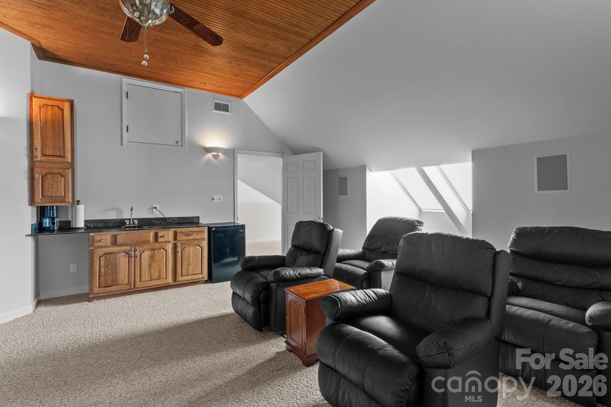 221 Windemere Isle Road Statesville, NC 28677 - Photo 20 of 42 a living room with furniture and kitchen view