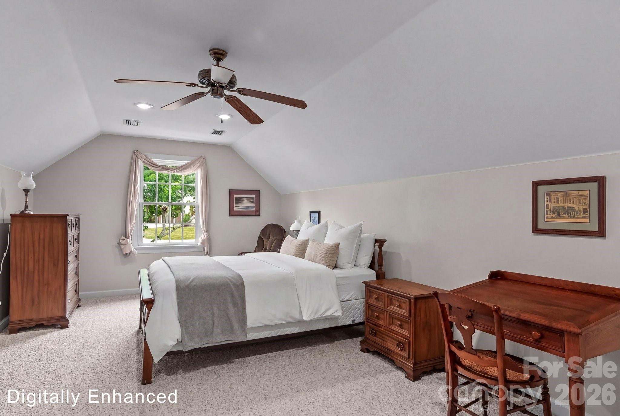 221 Windemere Isle Road Statesville, NC 28677 - Photo 23 of 42 a bedroom with a bed dresser and a window
