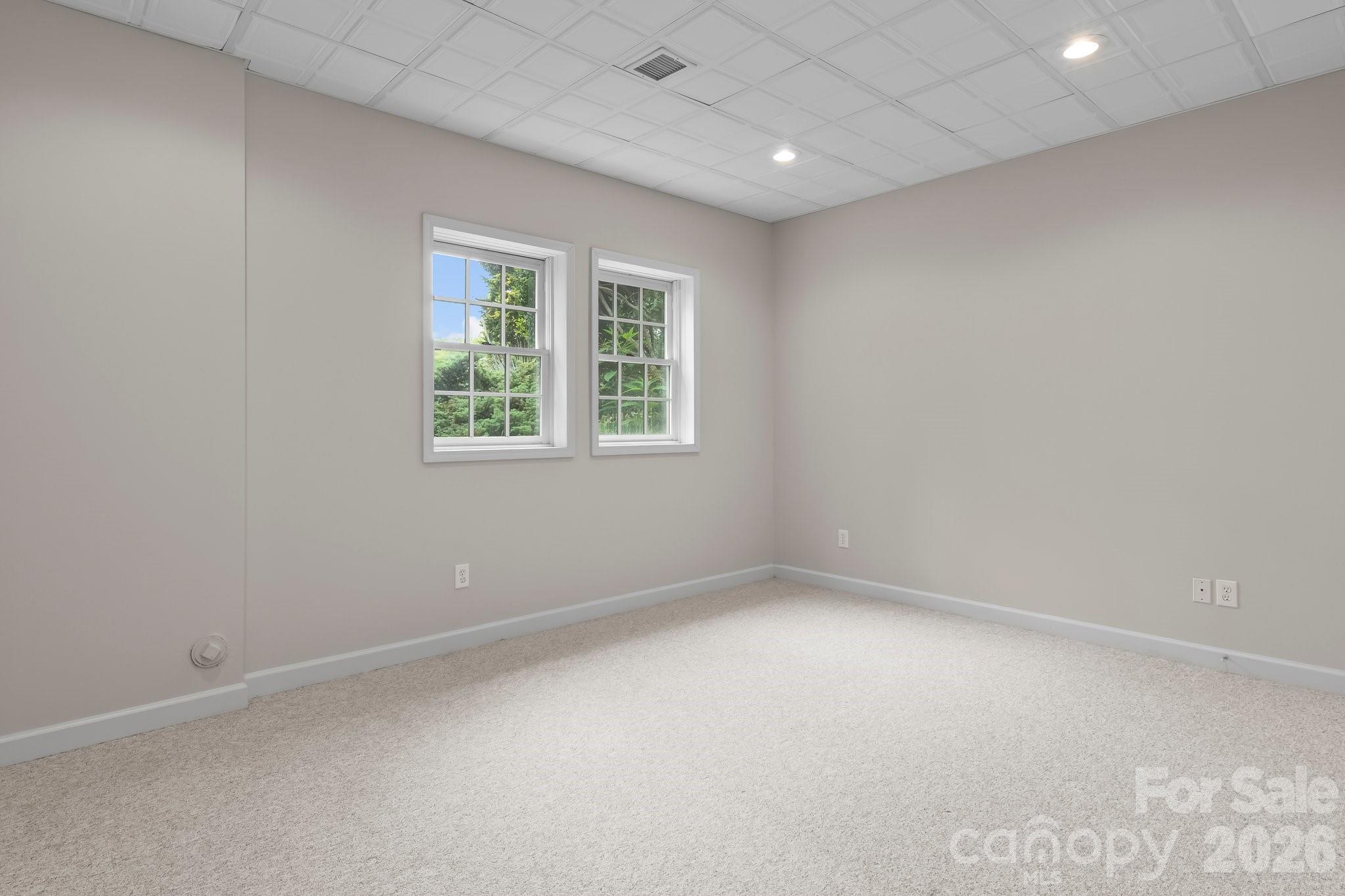 221 Windemere Isle Road Statesville, NC 28677 - Photo 24 of 42 an empty room with a window