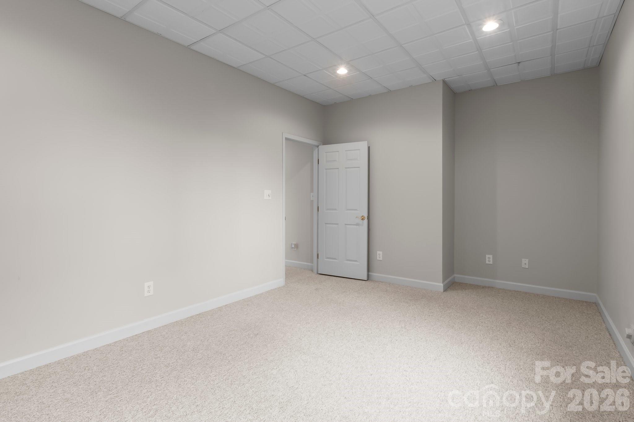 221 Windemere Isle Road Statesville, NC 28677 - Photo 25 of 42 an empty room with an entryway