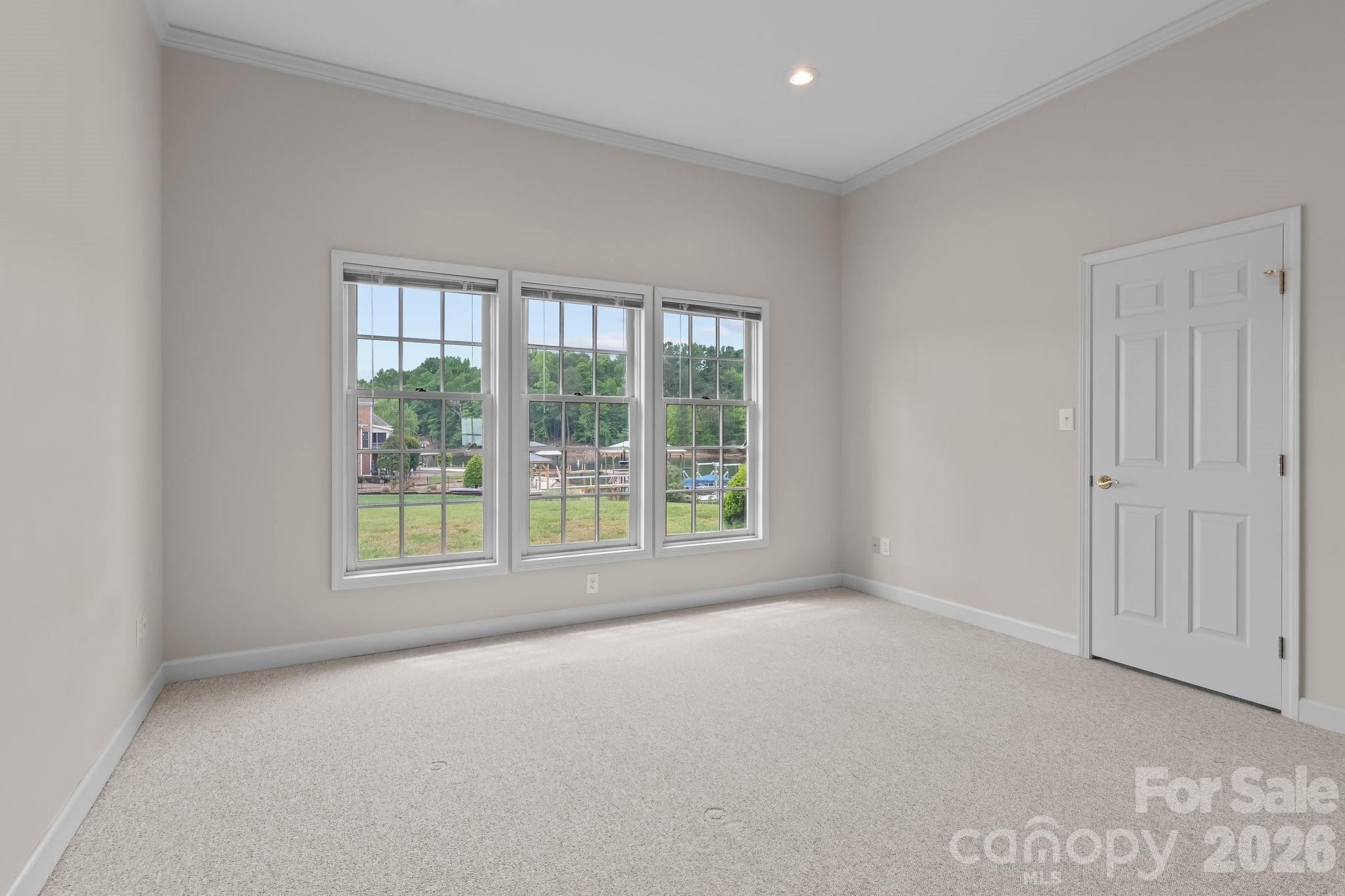 221 Windemere Isle Road Statesville, NC 28677 - Photo 26 of 42 an empty room with a window
