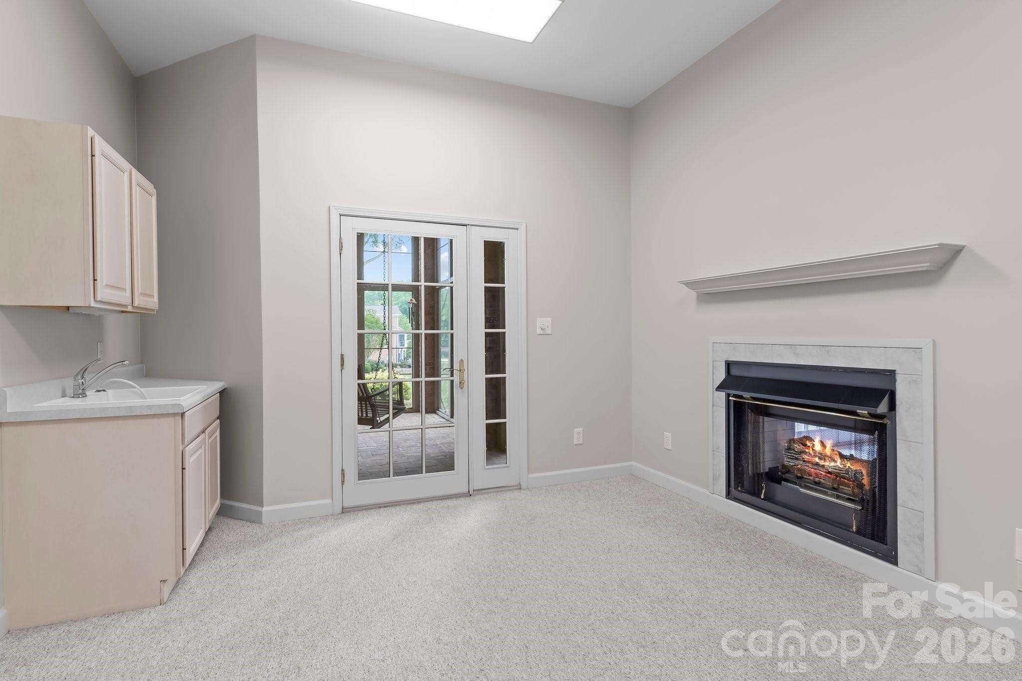 221 Windemere Isle Road Statesville, NC 28677 - Photo 29 of 42 a view of an empty room with a fireplace