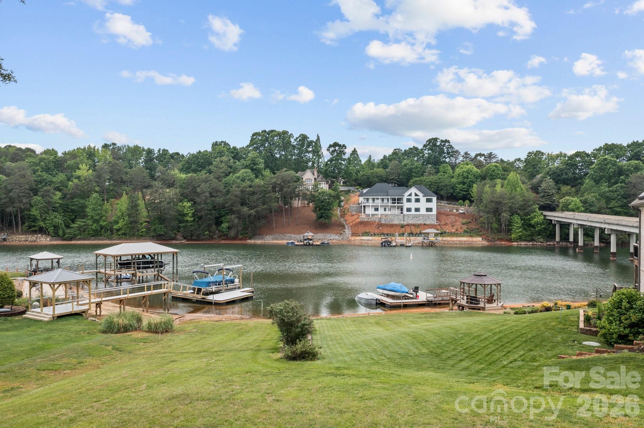 221 Windemere Isle Road Statesville, NC 28677 - Photo 35 of 42 a view of a lake with houses