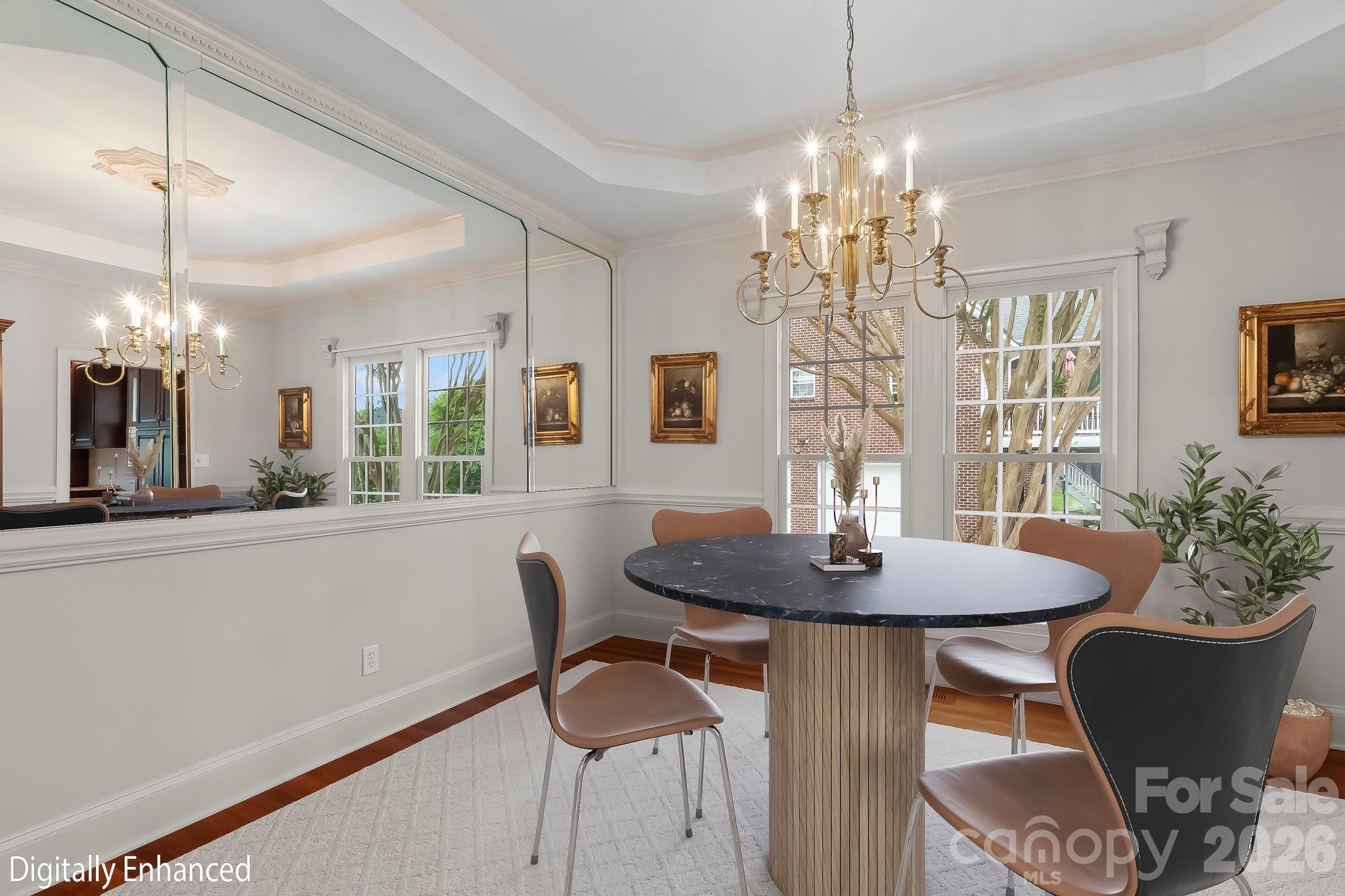 221 Windemere Isle Road Statesville, NC 28677 - Photo 6 of 42 a dining room with furniture a chandelier and window