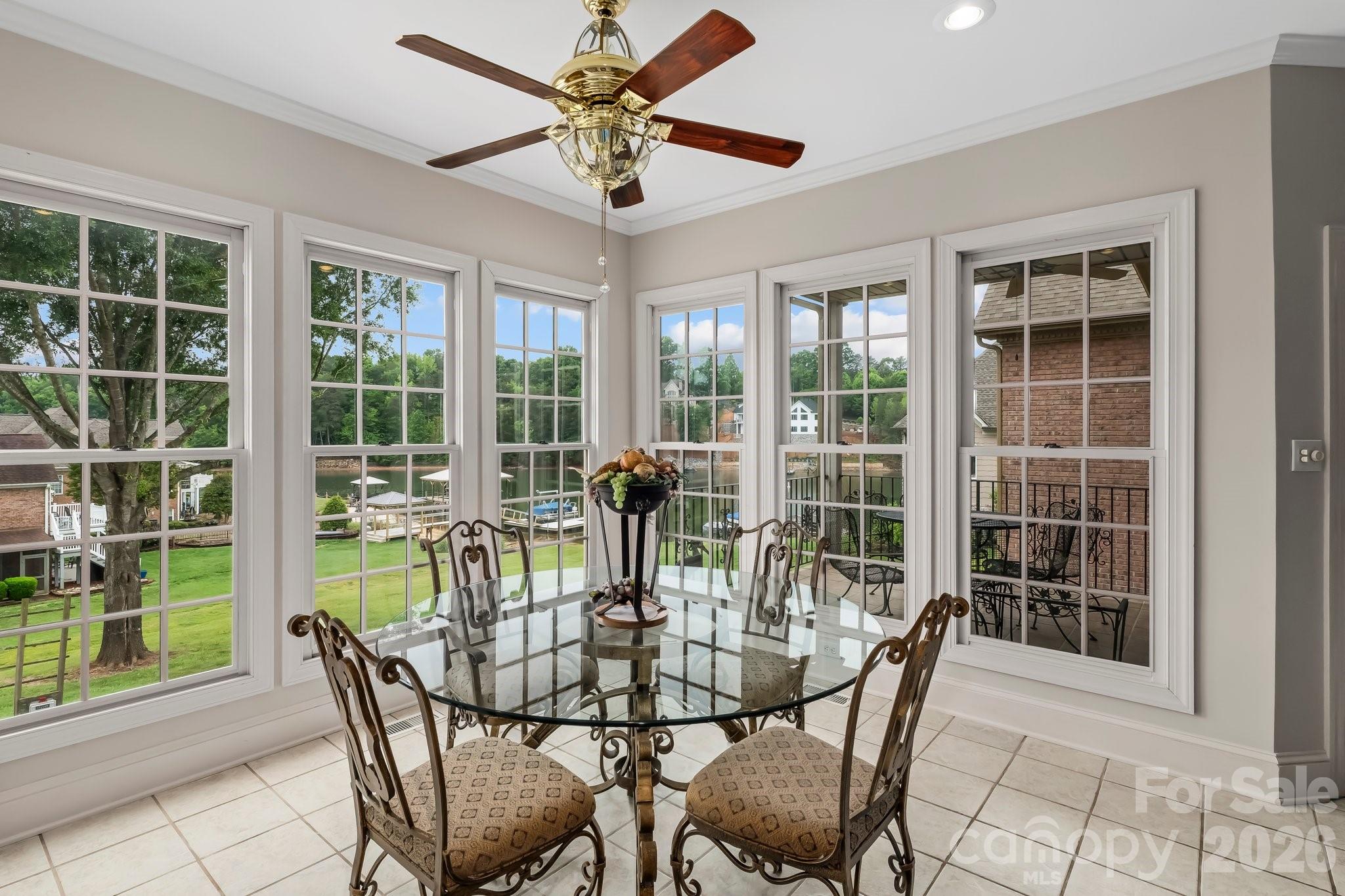 221 Windemere Isle Road Statesville, NC 28677 - Photo 7 of 42 a view of a dining room with furniture window and outside view