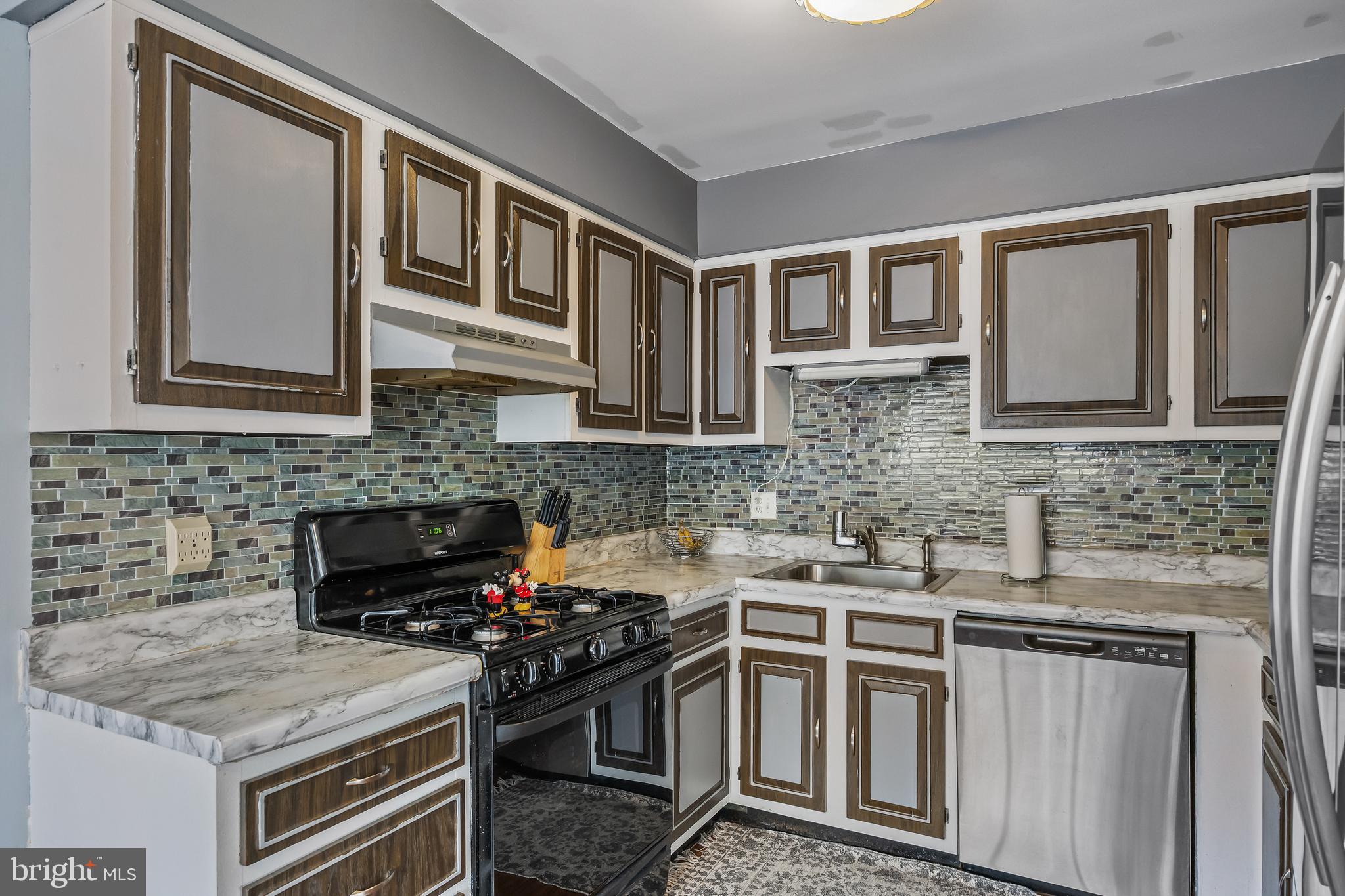 51 Blue Spruce Court Lumberton, NJ 08048 - Photo 7 of 28 a kitchen with stainless steel appliances granite countertop a stove and a granite counter tops