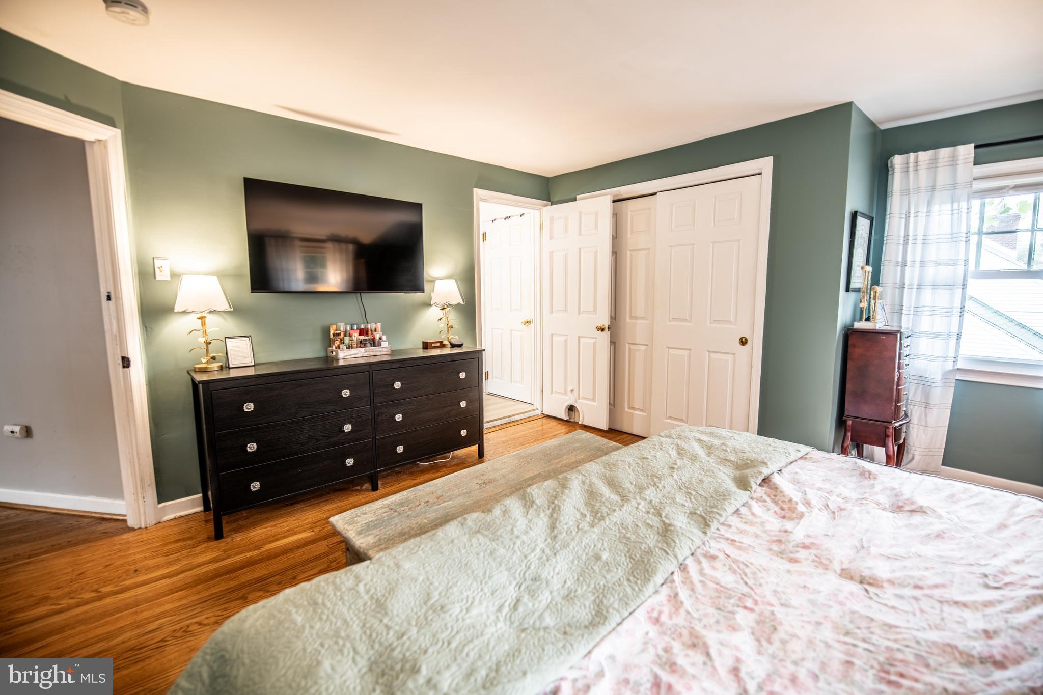 141 Cascade Road Springfield, PA 19064 - Photo 15 of 29 a bedroom with a bed and a flat screen tv