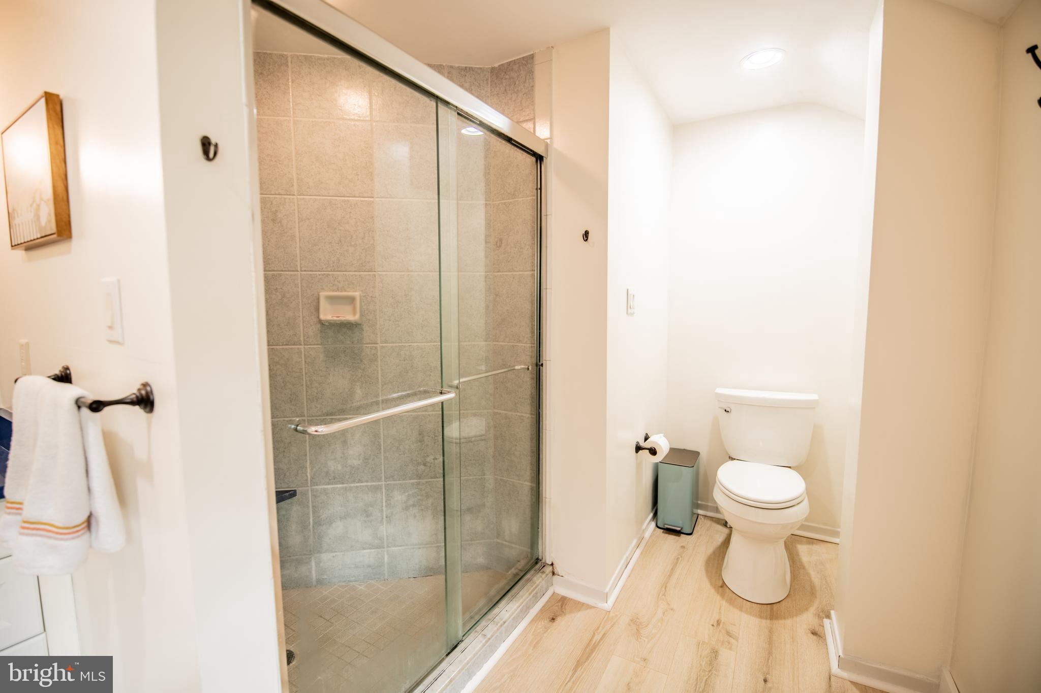 141 Cascade Road Springfield, PA 19064 - Photo 17 of 29 a bathroom with a toilet and a shower