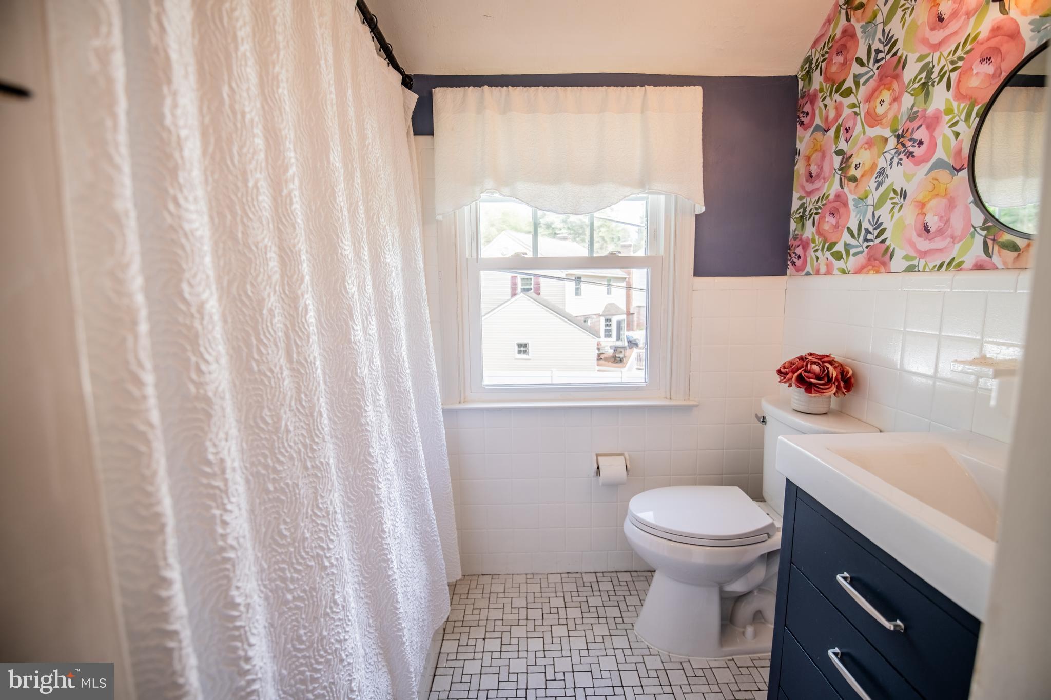 141 Cascade Road Springfield, PA 19064 - Photo 19 of 29 a bathroom with a sink toilet and a shower