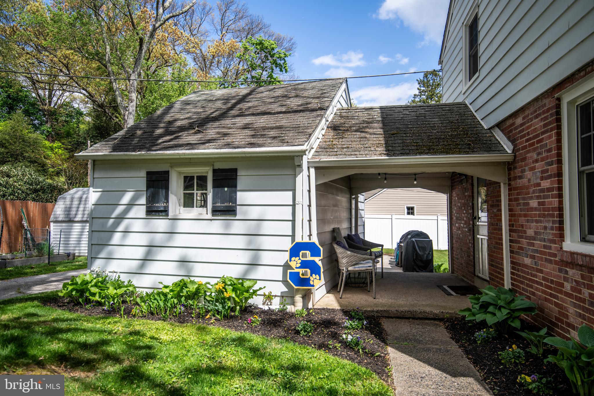 141 Cascade Road Springfield, PA 19064 - Photo 2 of 29 a front view of a house with a yard