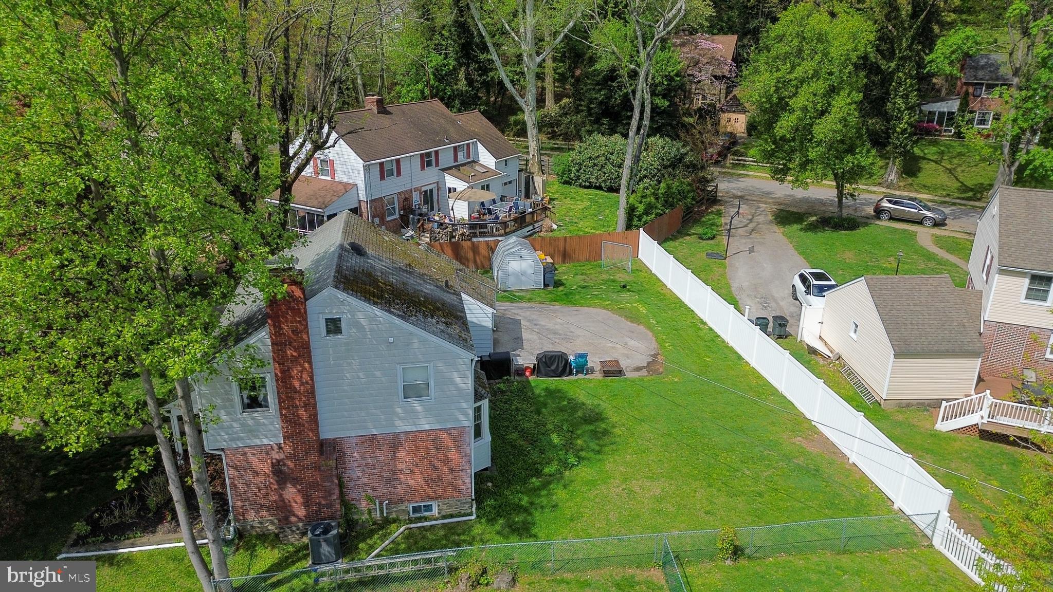 141 Cascade Road Springfield, PA 19064 - Photo 27 of 29 an aerial view of a house with a garden