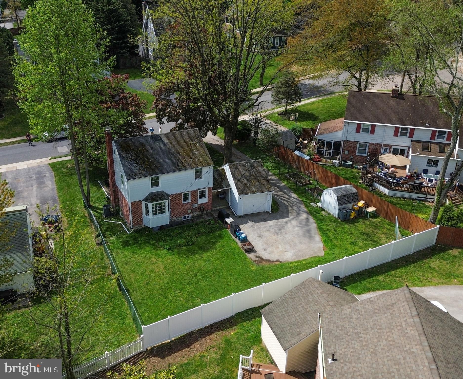 141 Cascade Road Springfield, PA 19064 - Photo 28 of 29 an aerial view of a house with swimming pool garden and patio