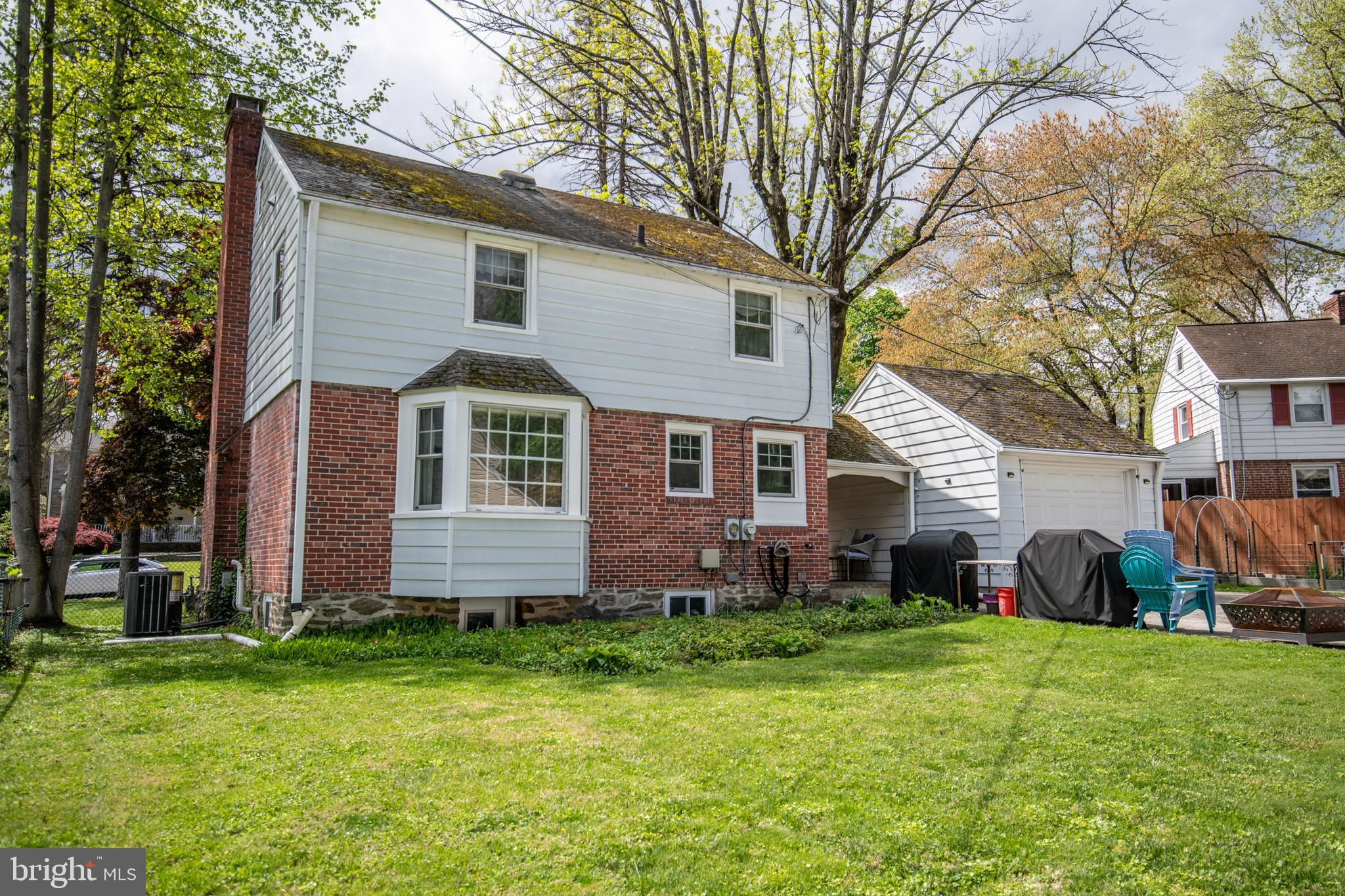 141 Cascade Road Springfield, PA 19064 - Photo 29 of 29 a front view of house with yard and green space