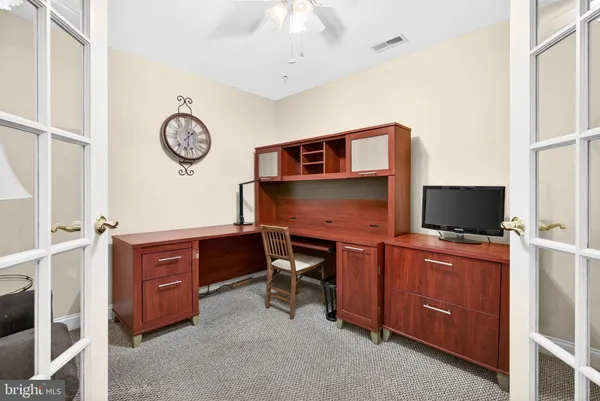 a room with furniture and flat screen tv